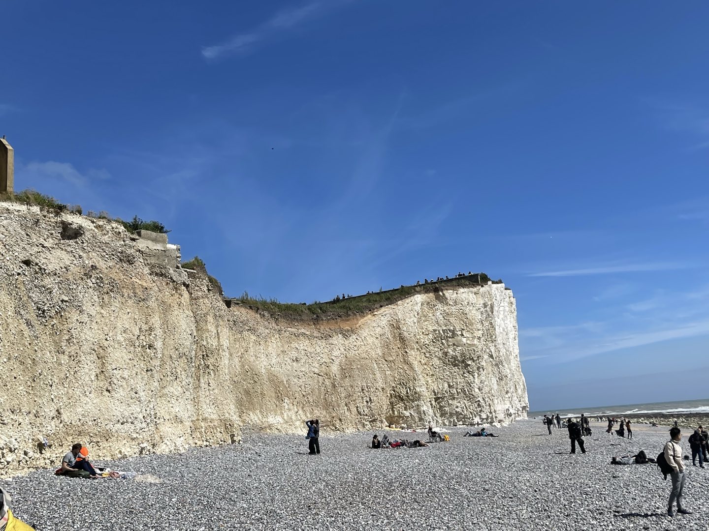White chalk cliffs above a pebble beach