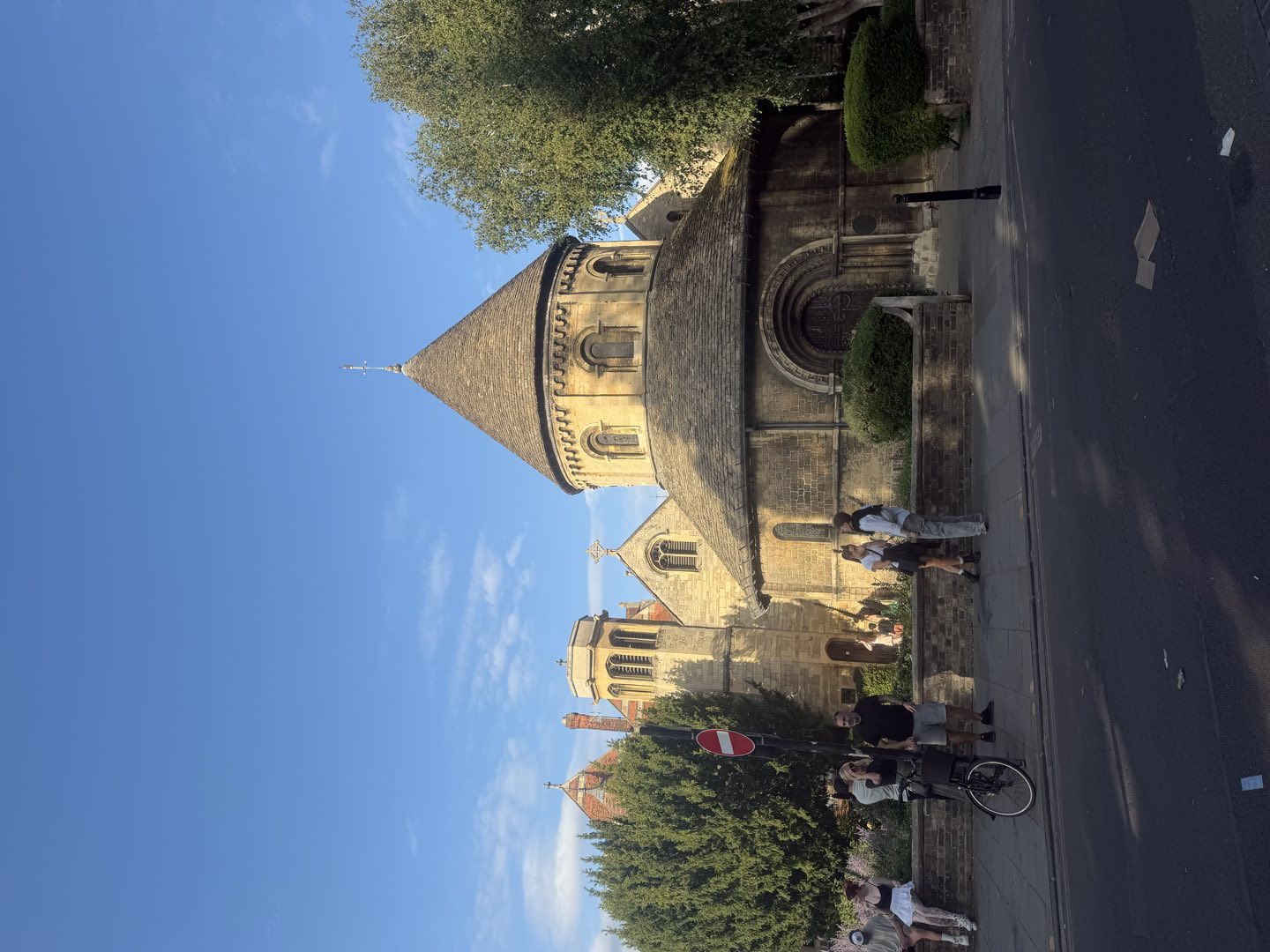 A round Norman church with a conical roof